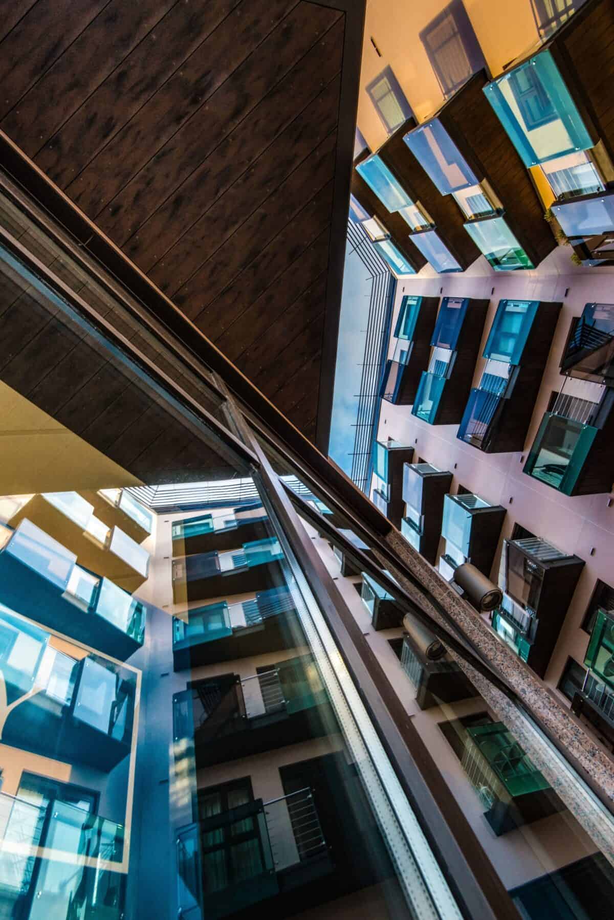 An apartment block reflected in a window, Castle Quay