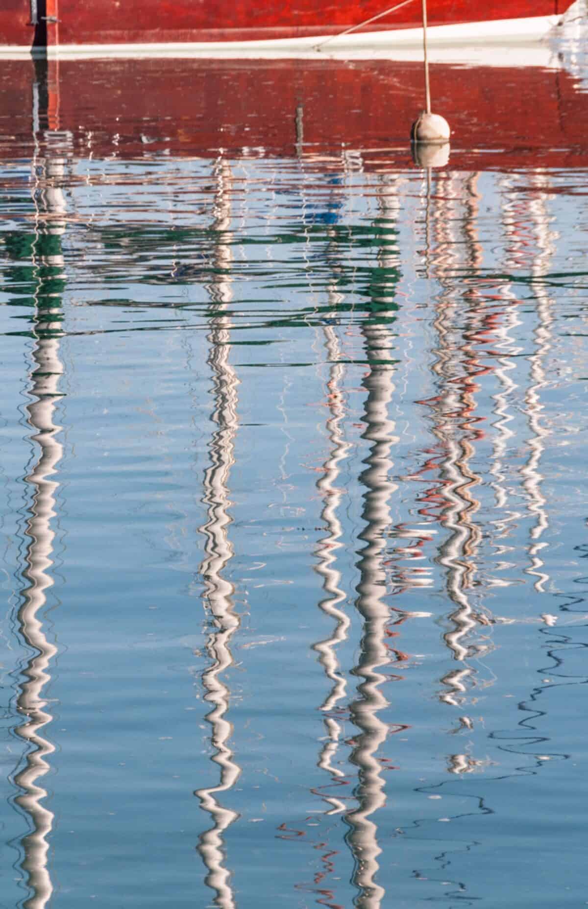 Boat mast reflections from St. Aubin's Pier, St. Aubin Harbour