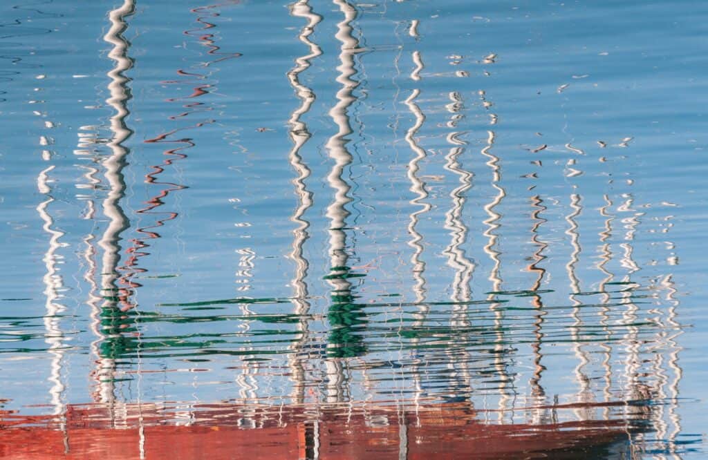Boat mast reflections from St. Aubin's Pier, St. Aubin Harbour