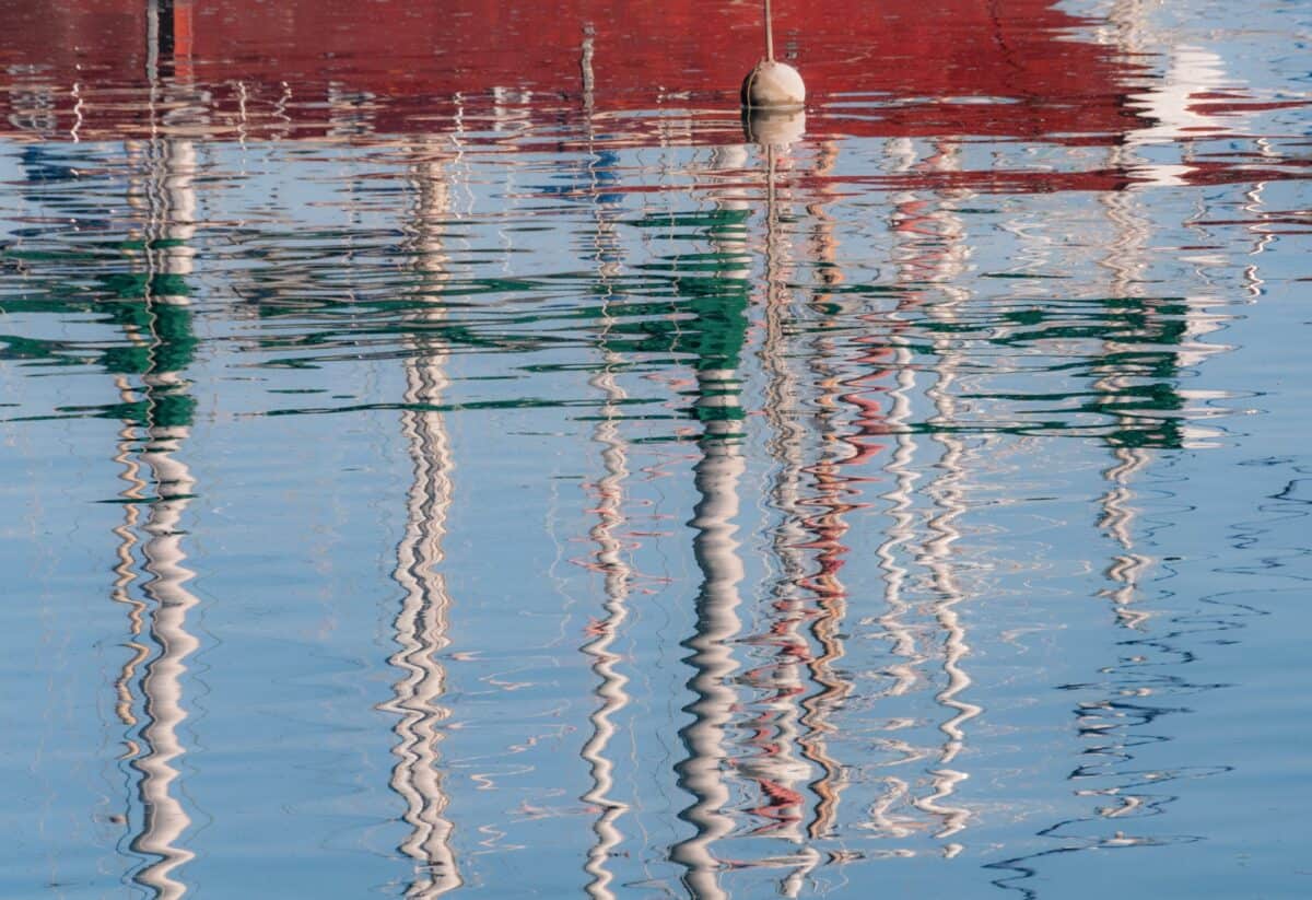 Boat mast reflections from St. Aubin's Pier, St. Aubin Harbour