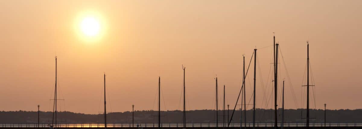 Boat masts at sunset at St. Helier Marina, St. Helier, Jersey