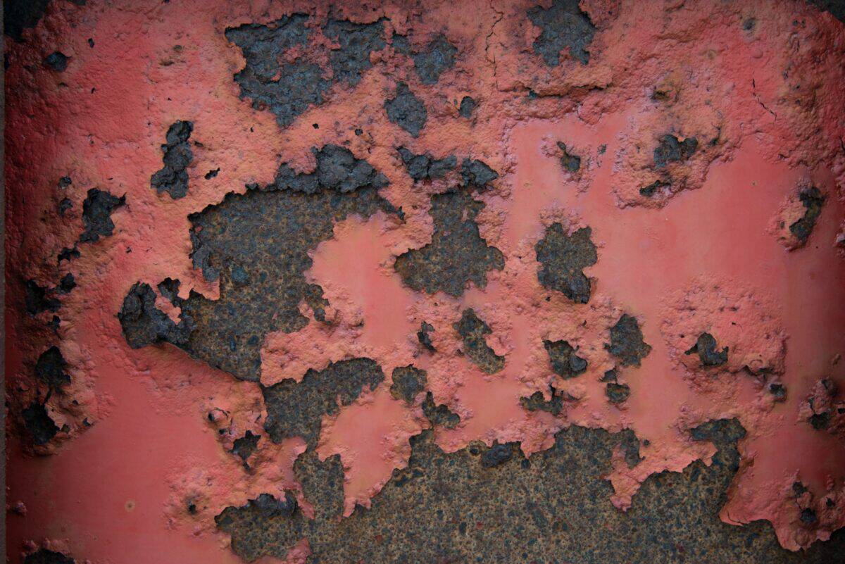 Coloured and textured rust on machinery near La Saline Slip