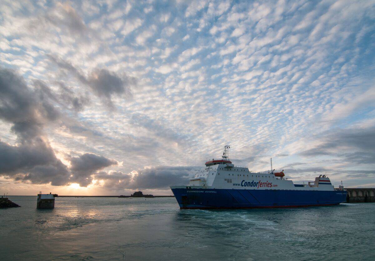 Condor Ferries arriving at the harbour at sunset, Albert Pier