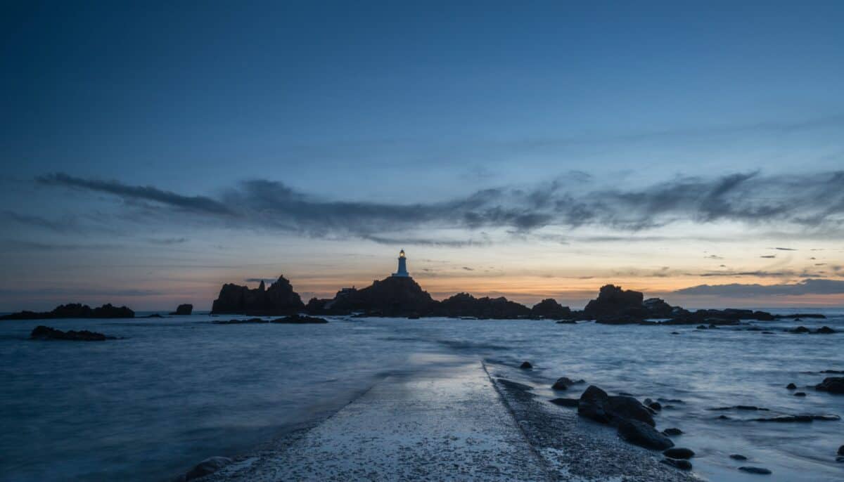 Corbière Lighthouse after sunset as the tide recedes