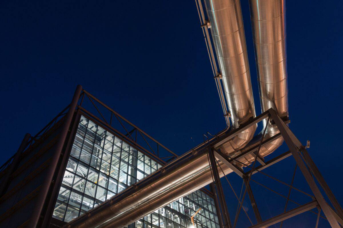 Energy from waste incinerator illuminated at night, La Collette