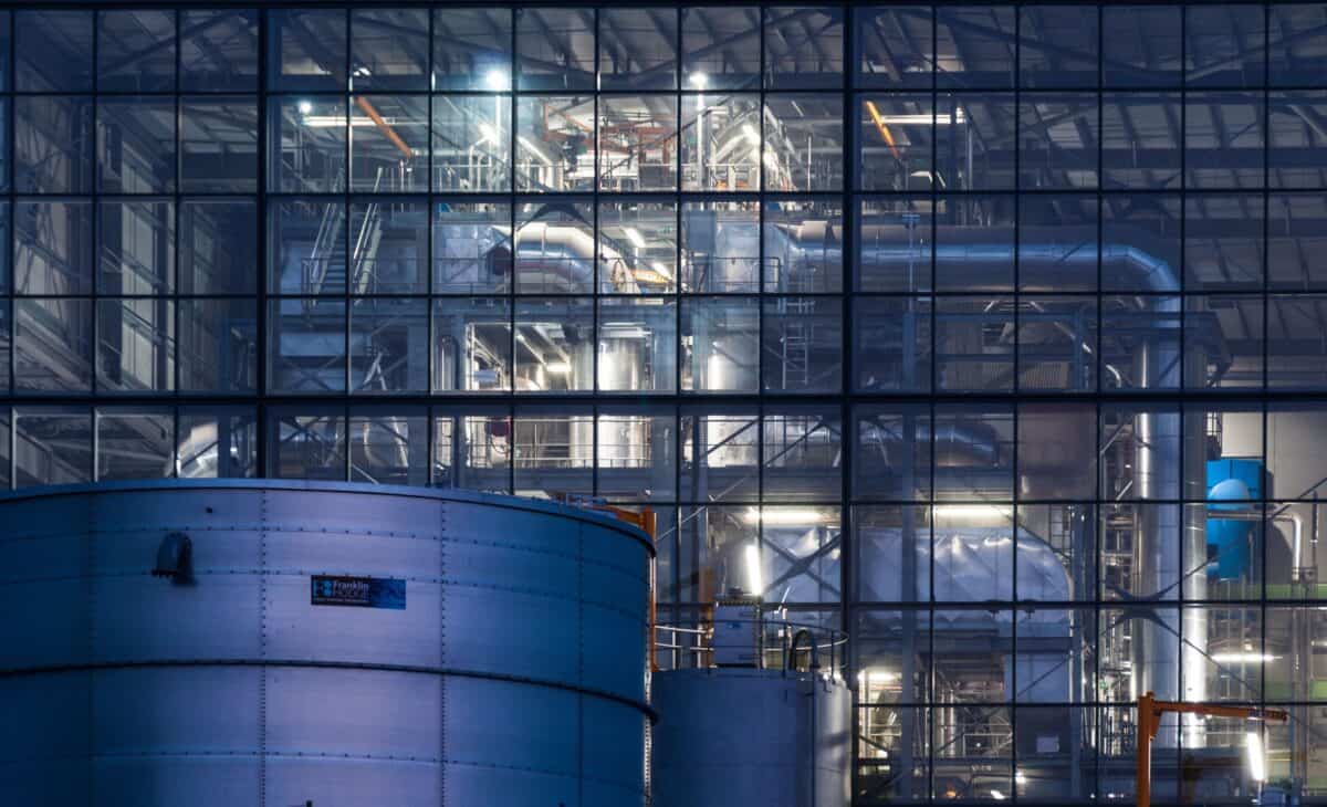 Energy from waste incinerator illuminated at night, La Collette