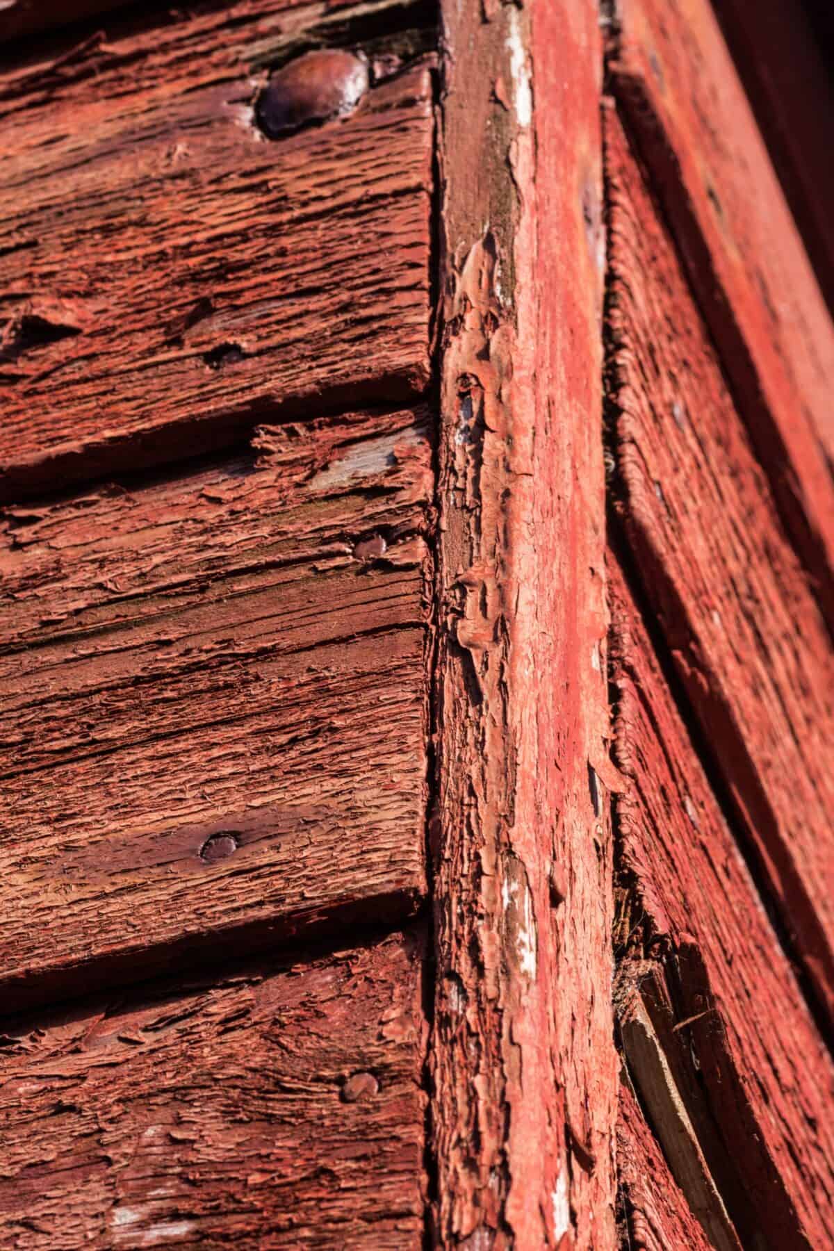 Flaking paint on old red fishing hut, Bonne Nuit Bay, St. John