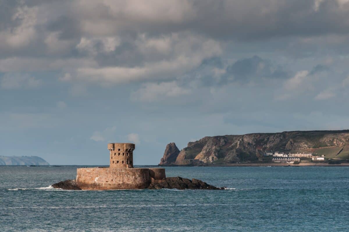 La Rocco Tower and Le Pinâcle and Guernsey in the sunlight