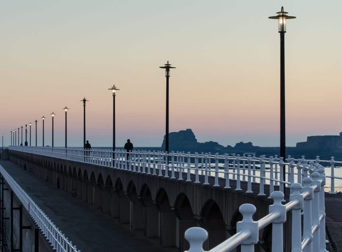 Lamps and railings at St. Helier Marina at sunset, St. Helier