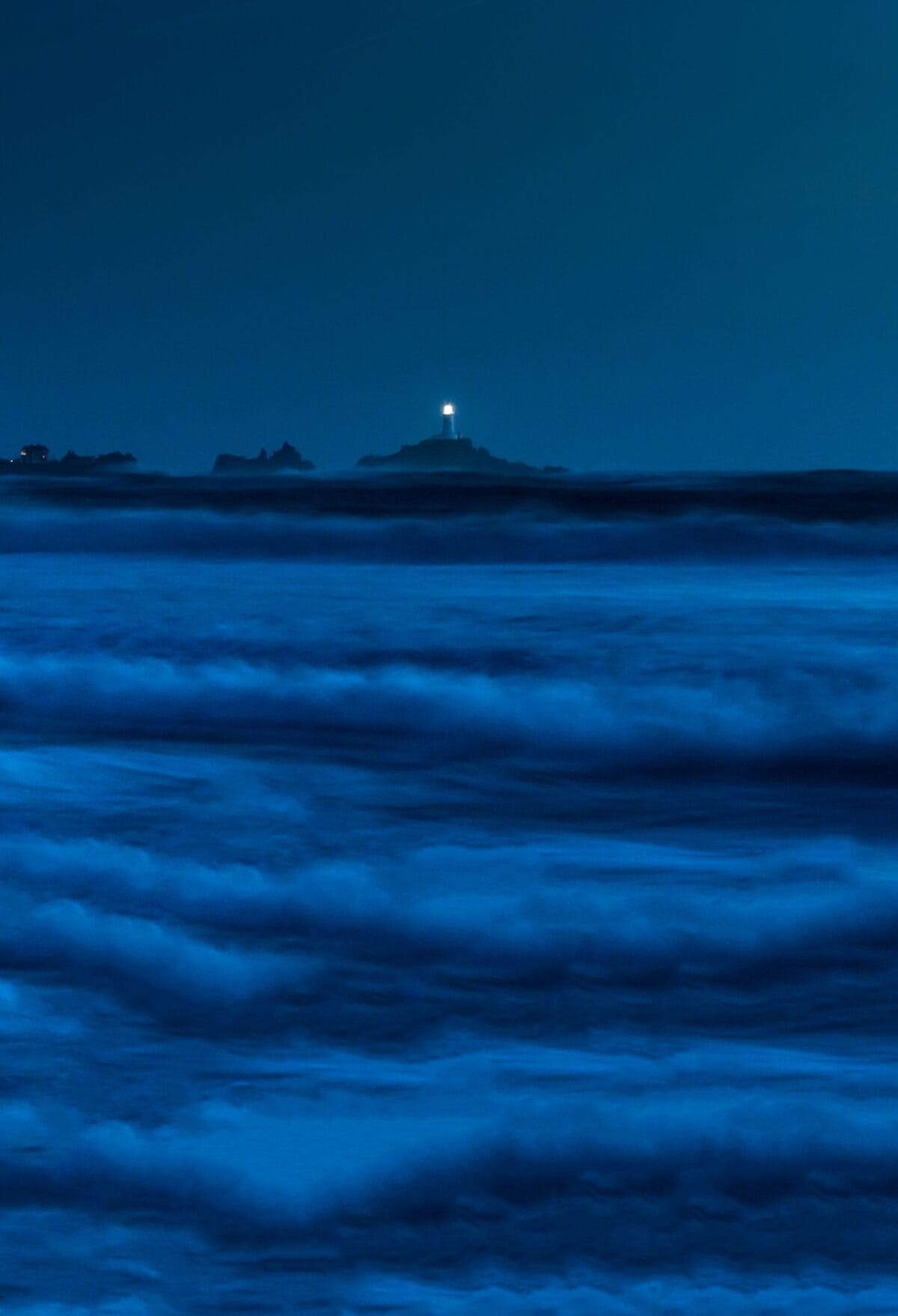 Night waves to Corbière Lighthouse, Le Braye, St. Brelade