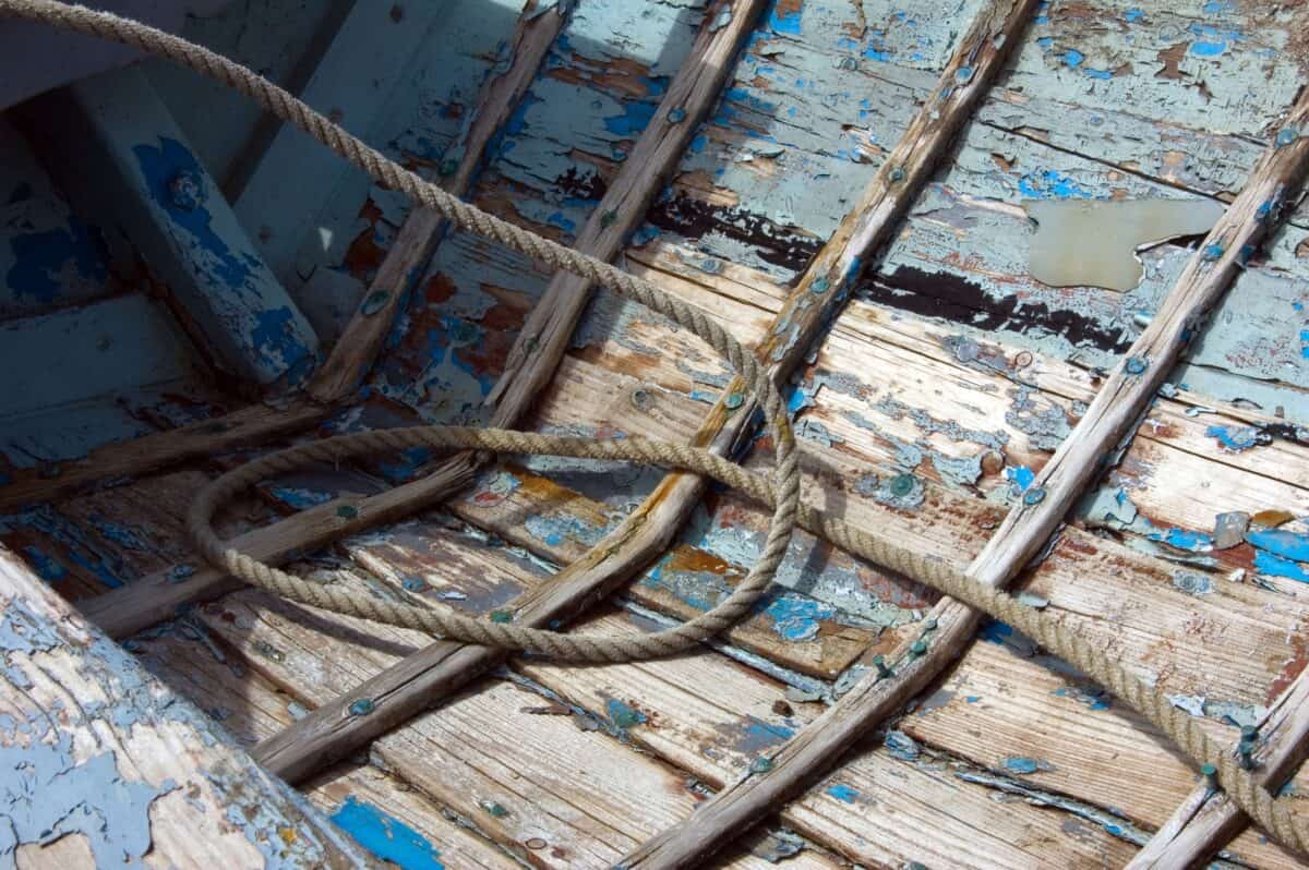 Old rowing boat on St. Aubin's Pier at St. Aubin, St. Brelade