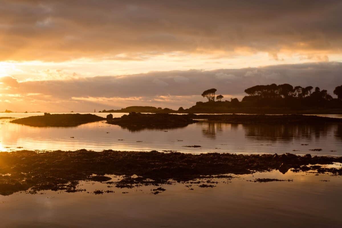 Sunset reflecting on the sea at Le Hocq, St. Clement, Jersey