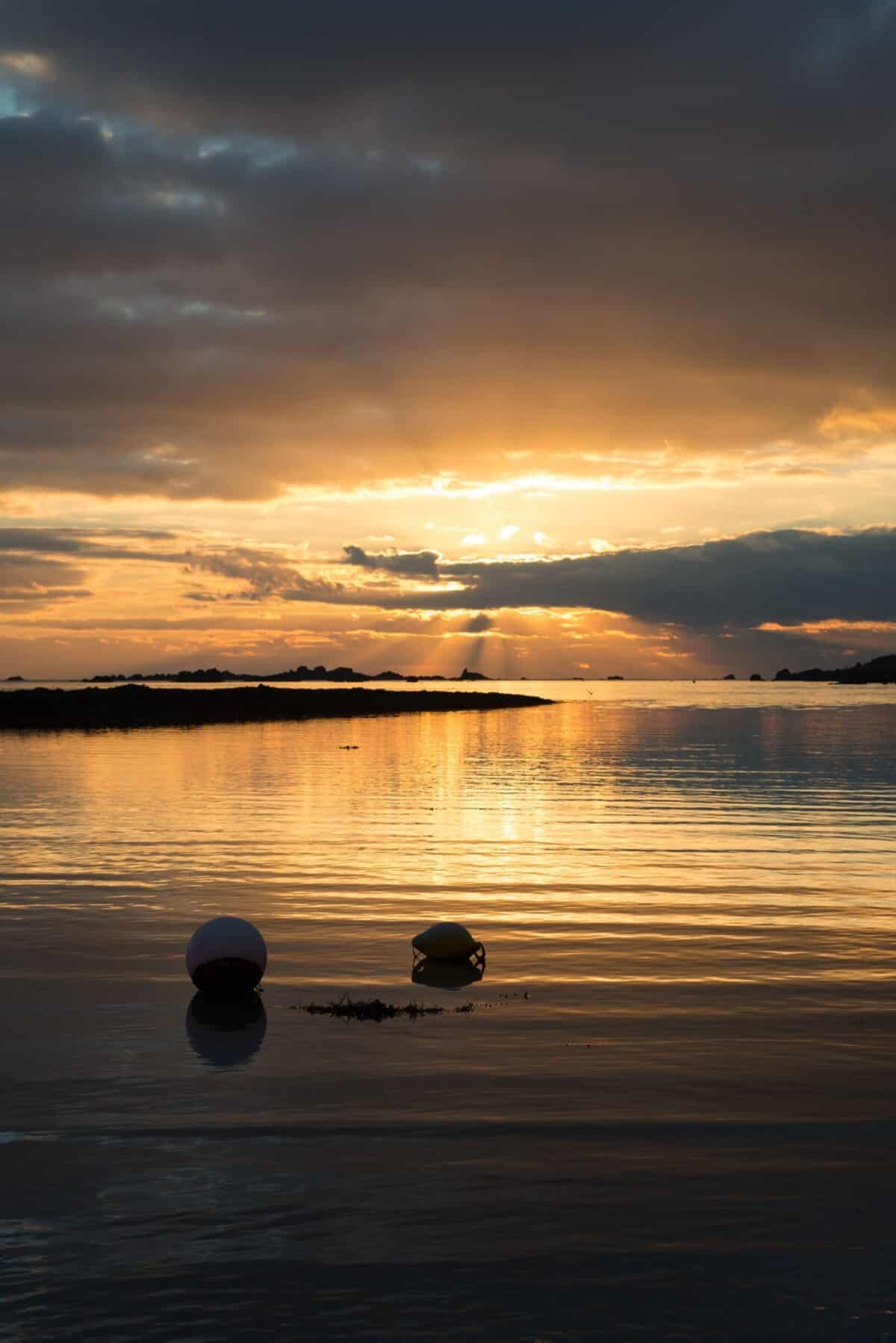 Sunset reflecting on the sea at Le Hocq, St. Clement, Jersey