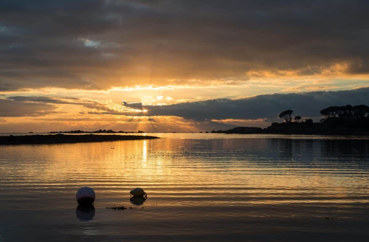 Sunset reflecting on the sea at Le Hocq, St. Clement, Jersey