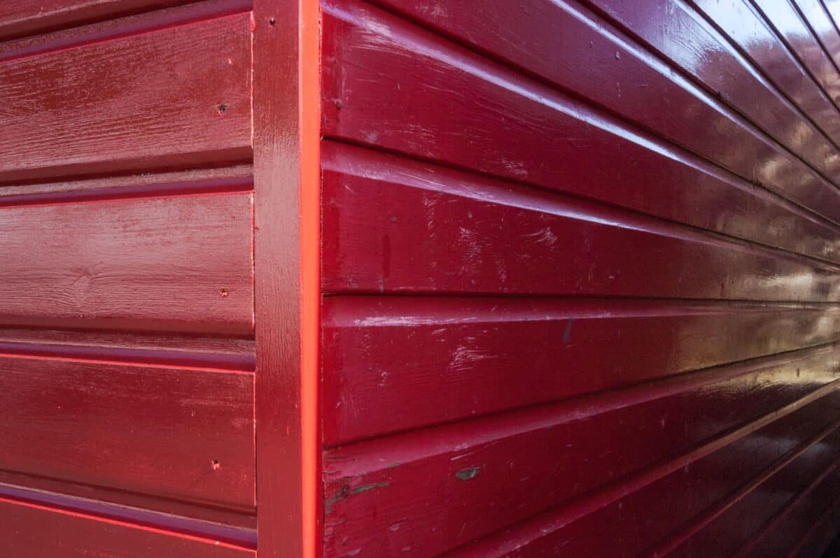 Painted red fishing hut on Rozel Pier, Rozel Bay, St. Martin