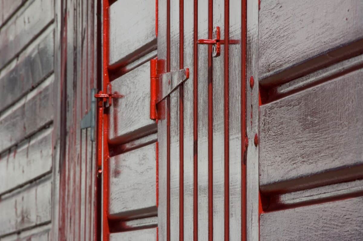 Painted red fishing hut on Rozel Pier, Rozel Bay, St. Martin
