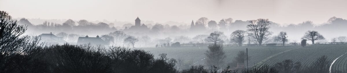 Panorama of the fog and mist, trees and fields, in the St. Lawrence countryside