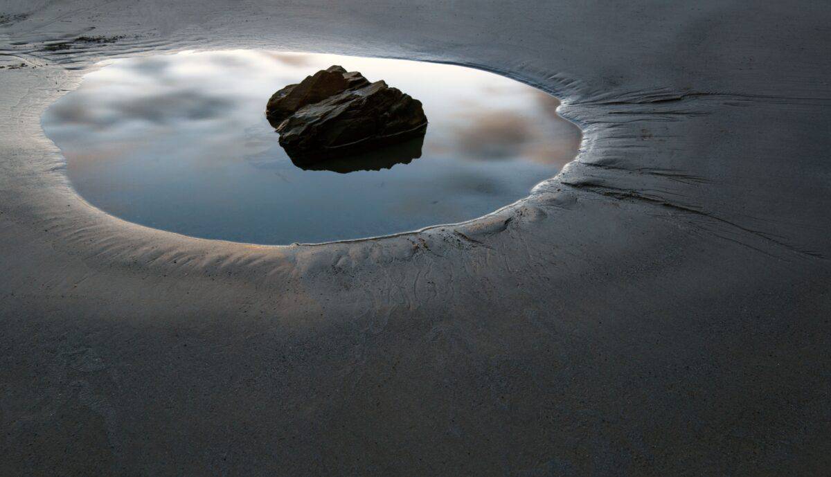 Rock pool at sunset near Faulkner Fisheries at L'Etacq, St. Ouen