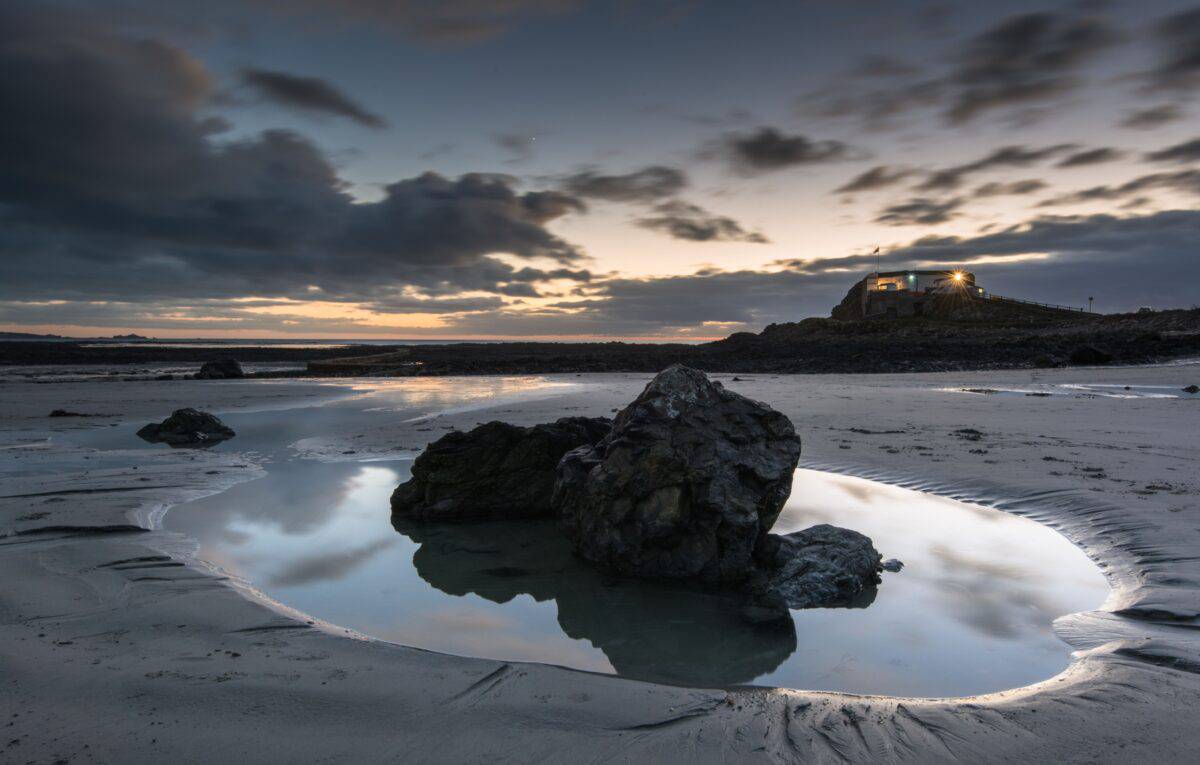 Rock pool at sunset near Faulkner Fisheries at L'Etacq, St. Ouen
