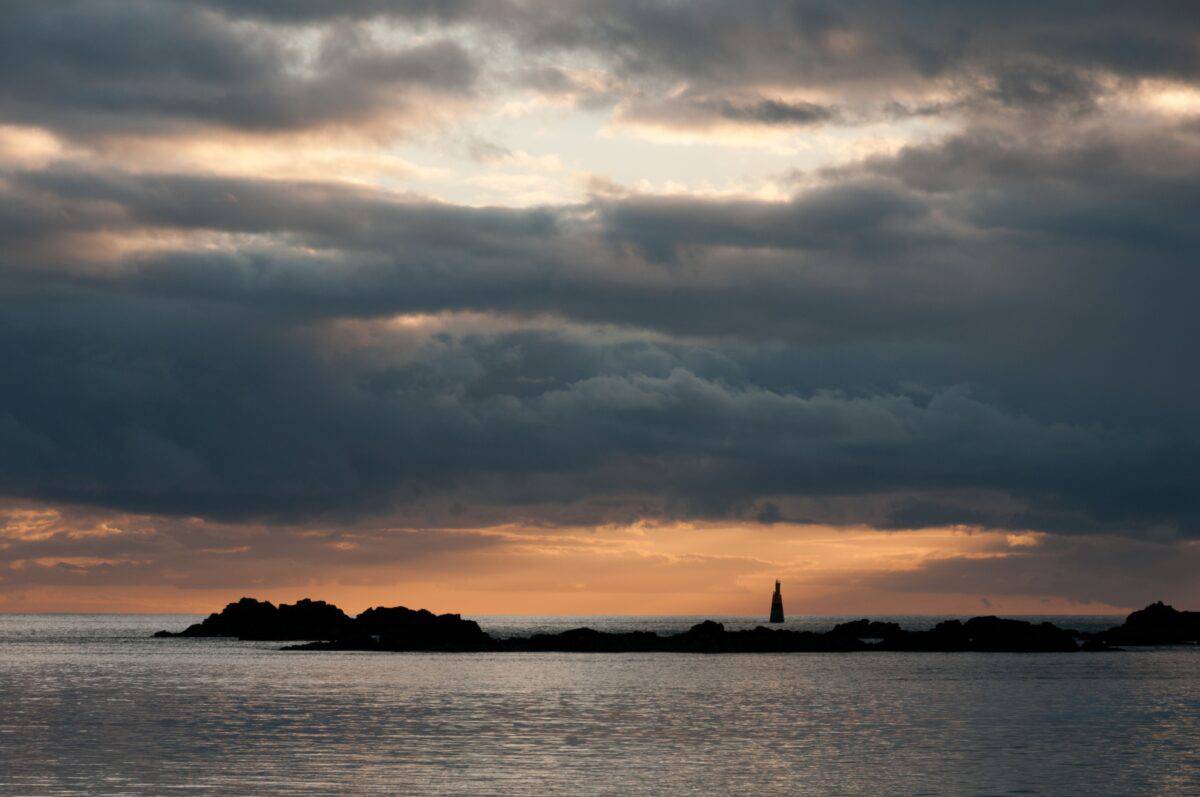 Sea and rocks at sunset from La Greve D'Azette, Jersey