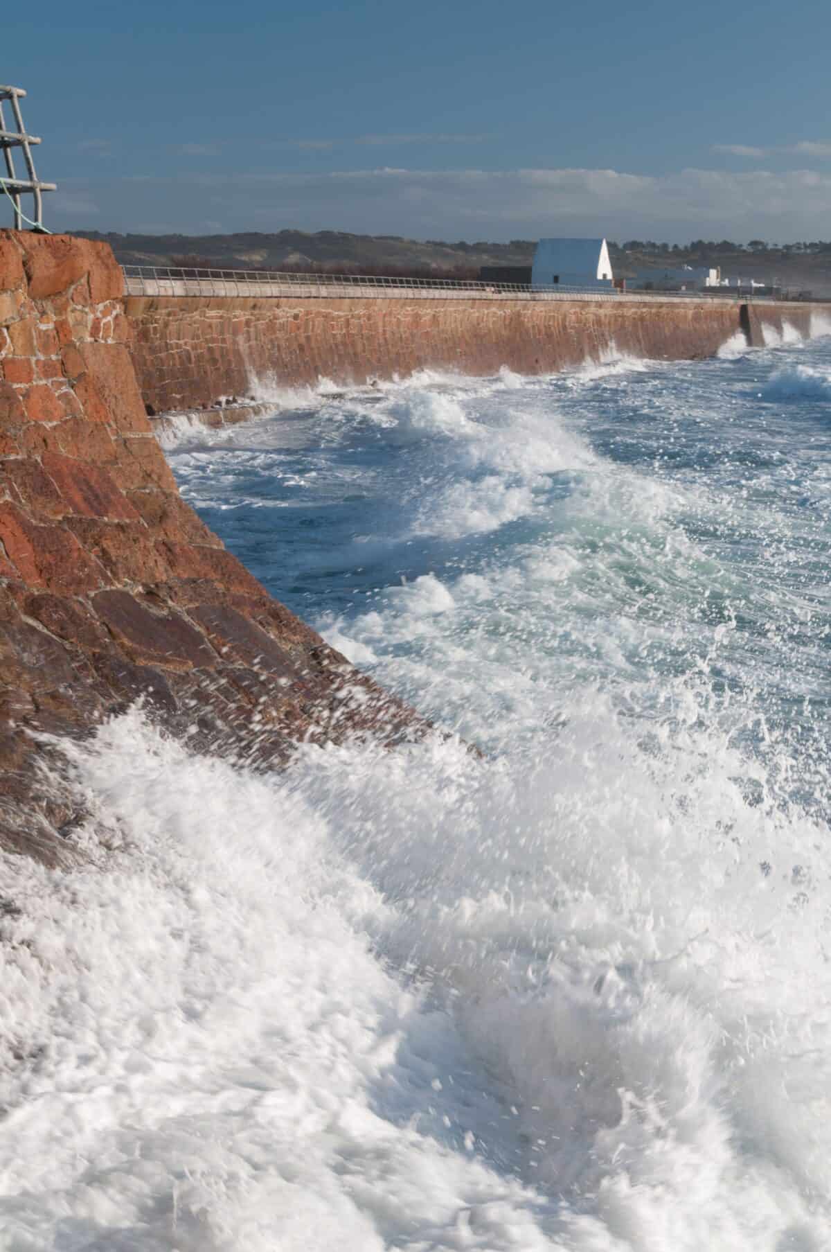 Big waves and The White House at L'Ouzière Slip, St. Ouen's Bay