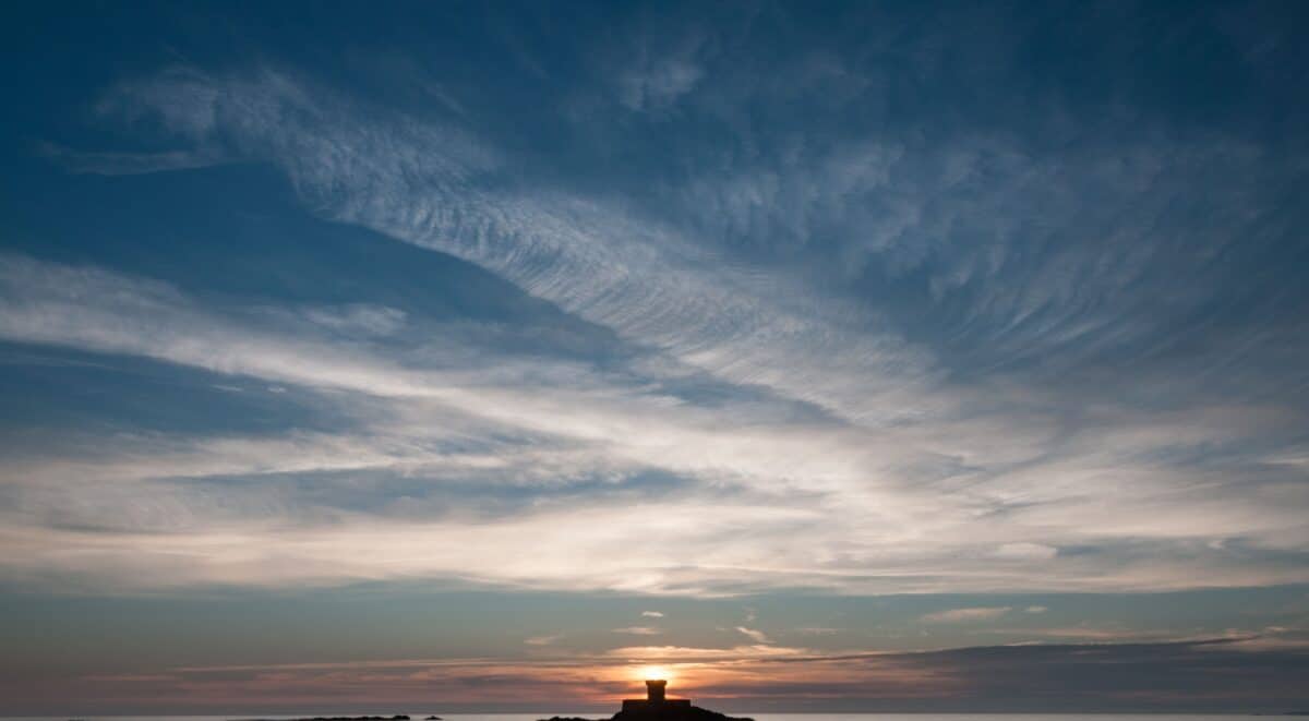 Sunset behind La Rocco Tower, Le Braye, St. Helier, Jersey