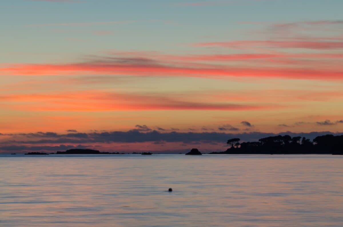Sunset looking to Green island from La Charrière au Long Slip