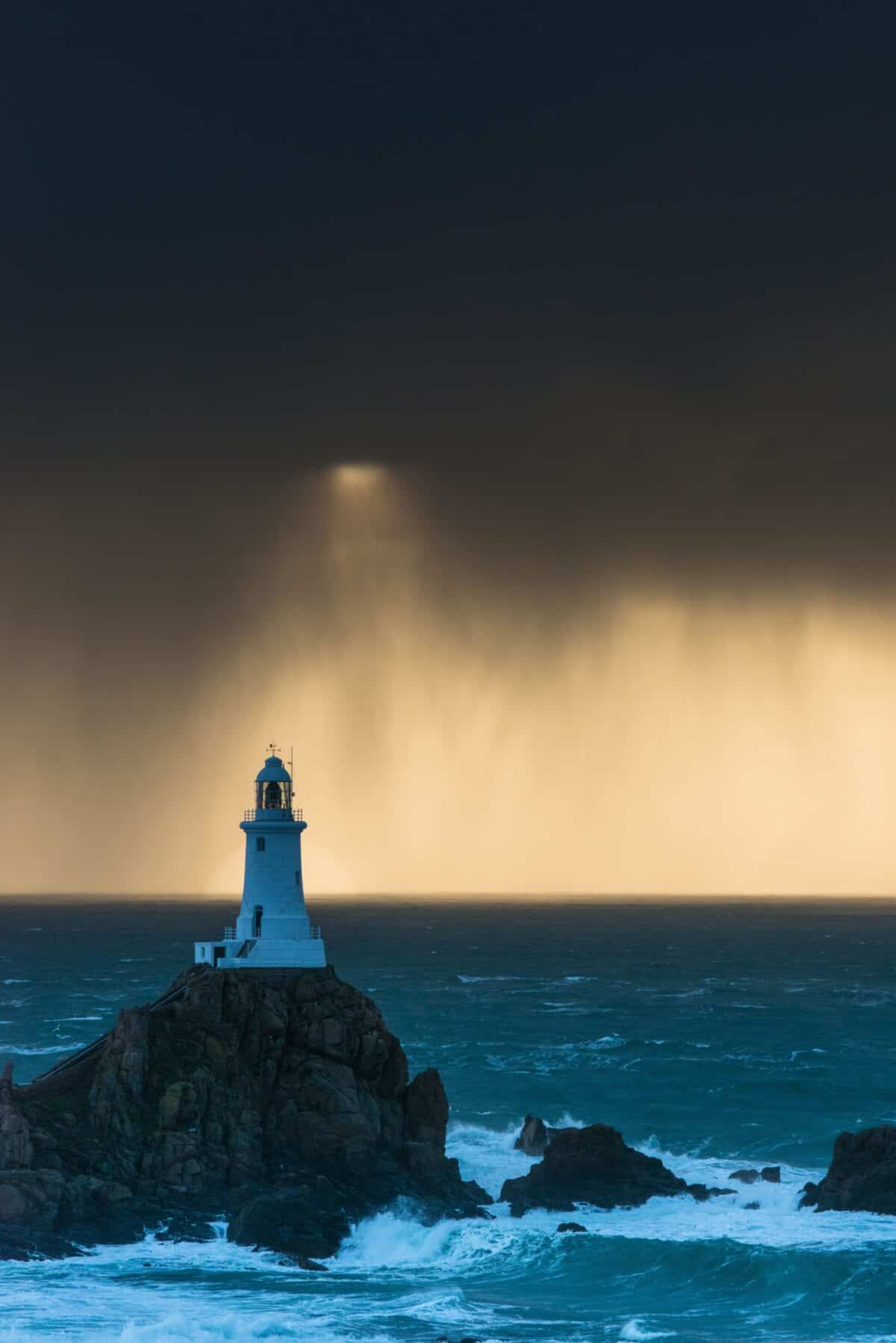 Sunset at Corbière Lighthouse during a really heavy rain storm