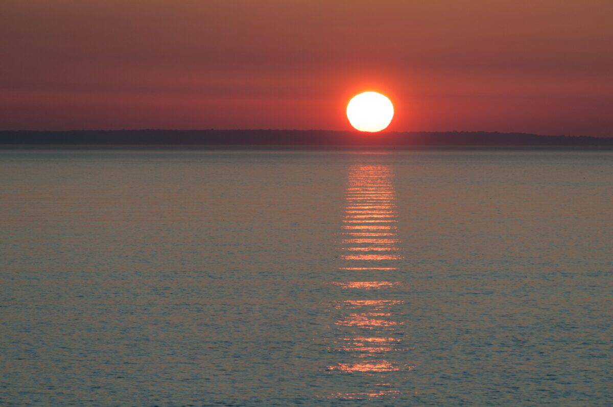 Sunset over Sark and the sea, Devil's Hole, St. Mary, Jersey