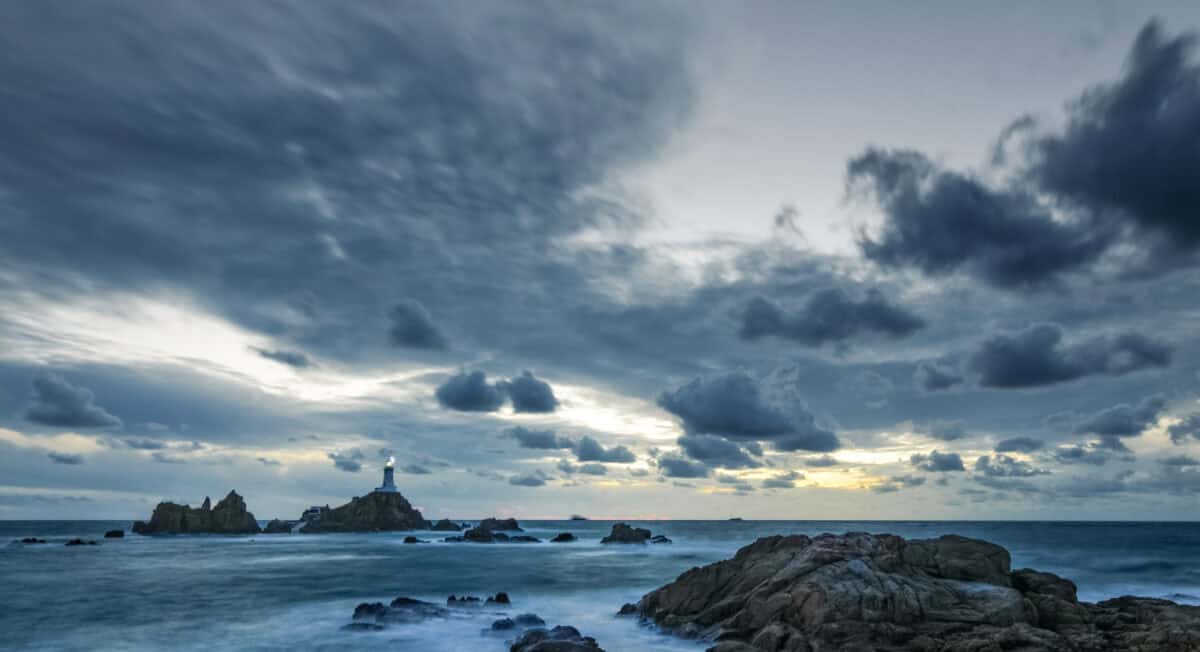 Windswept sea and clouds at sunset, Corbière Lighthouse