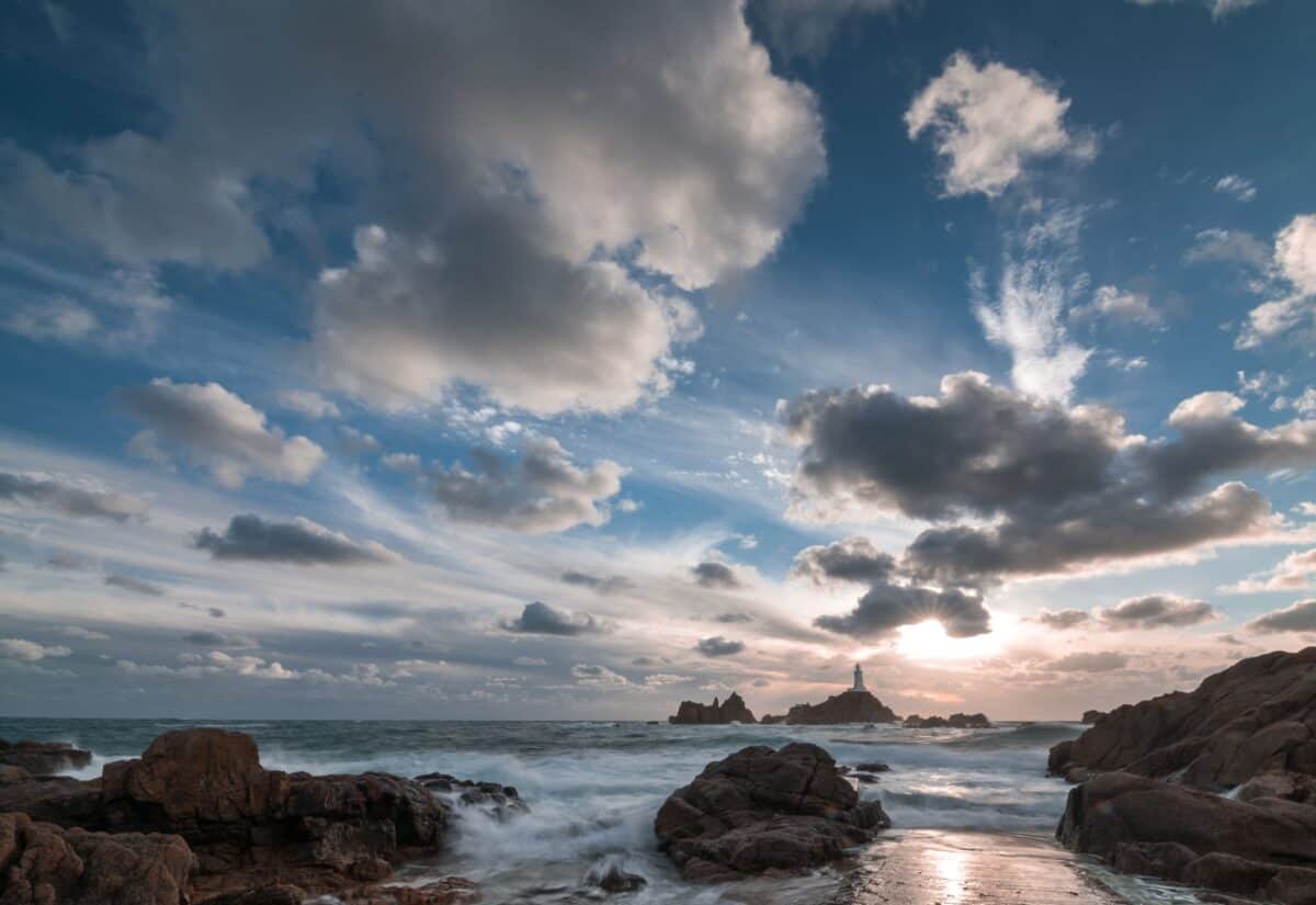 Windswept sea and clouds at sunset, Corbière Lighthouse